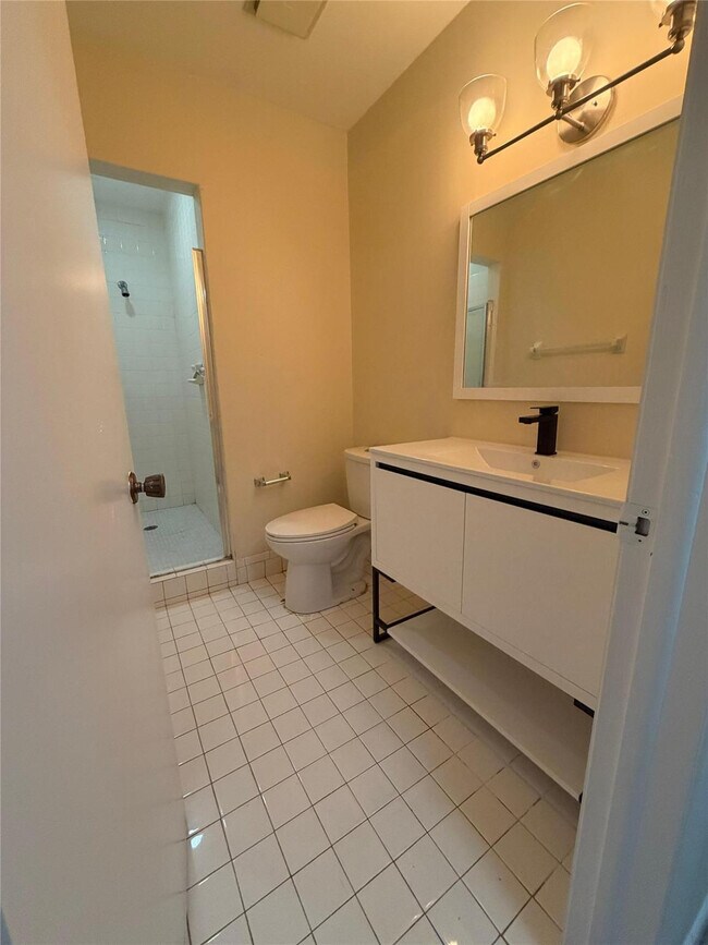 Building Photo - 7410 Woodmont Terrace