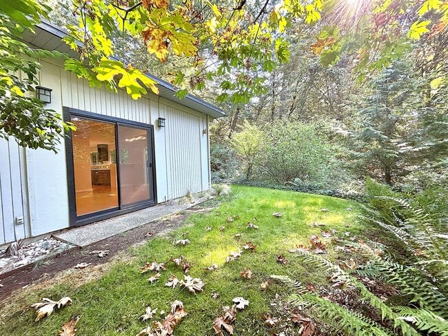 Building Photo - Gorgeous mid century modern home featuring...