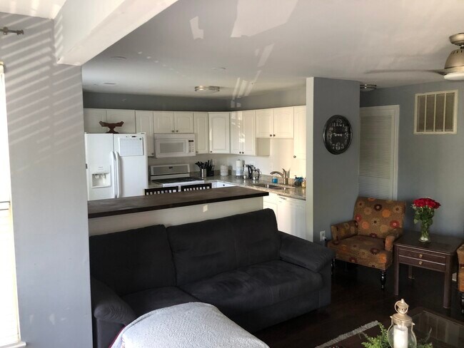 Building Photo - 7518 Snowpea Court, Unit E