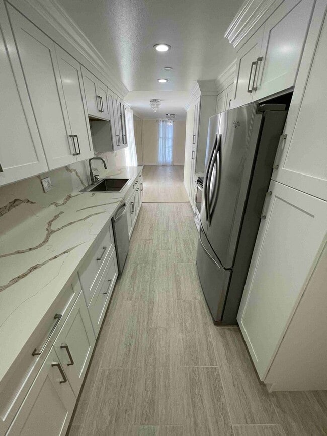 Building Photo - COMPLETELY UPDATED AND REMODELED ENCINO SP...