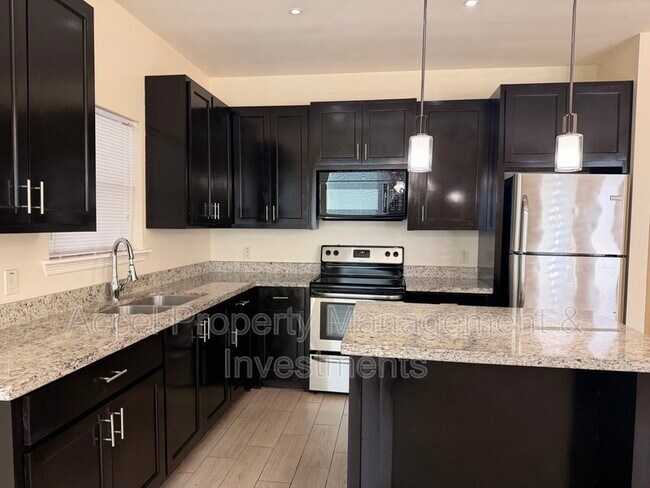 Building Photo - 209 Teak Dr
