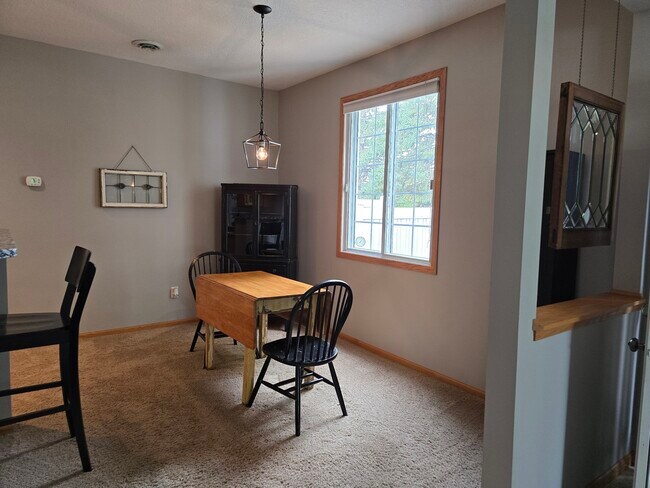 Building Photo - 9649 Peony Ln N