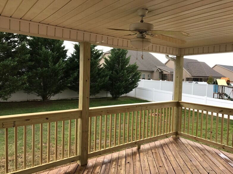 Covered porch with fenced in backyard - 8456 Lexie Lane