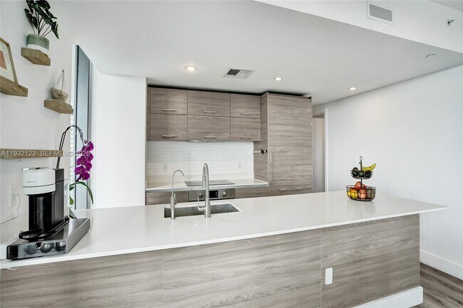 Building Photo - 1300 S Miami Ave