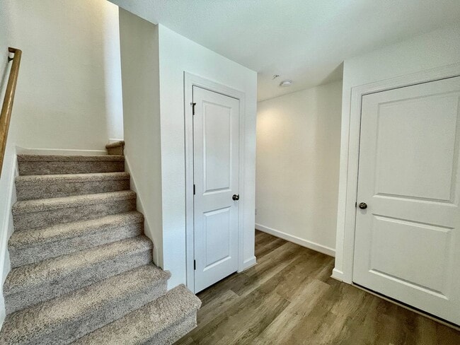 Building Photo - Practically New & Available NOW! Americana Luxury Townhomes! Pet Friendly! Attached Garage! All A...