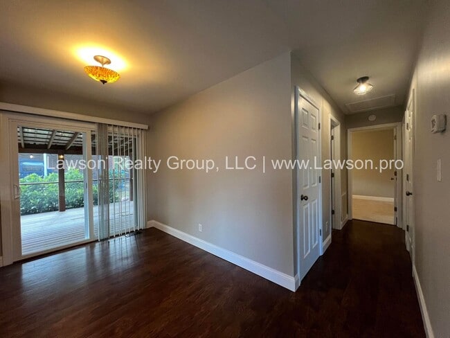 Building Photo - Charming Brick Ranch with Beautifully Landscaped Yard and Attached Carport