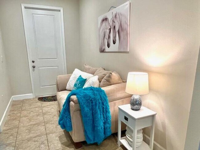 Building Photo - Open concept home offering four bedrooms, three baths, a two car garage and open lanai.
