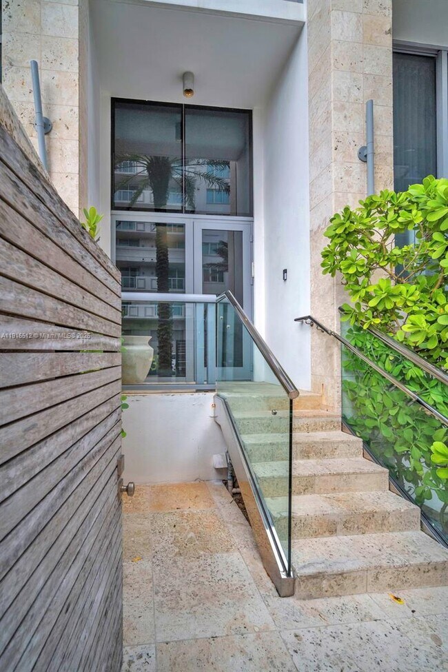 Building Photo - 9501 Collins Ave