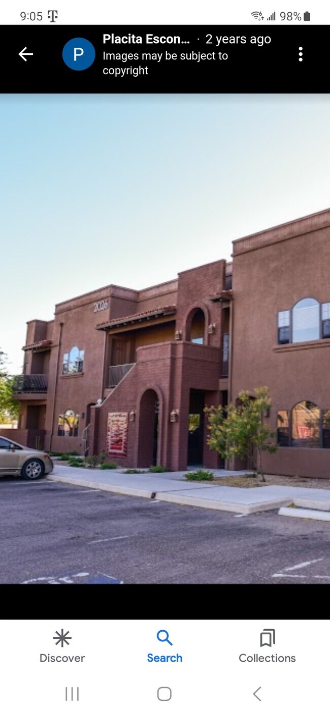 Front of condo and open parking - 2028 E River Rd