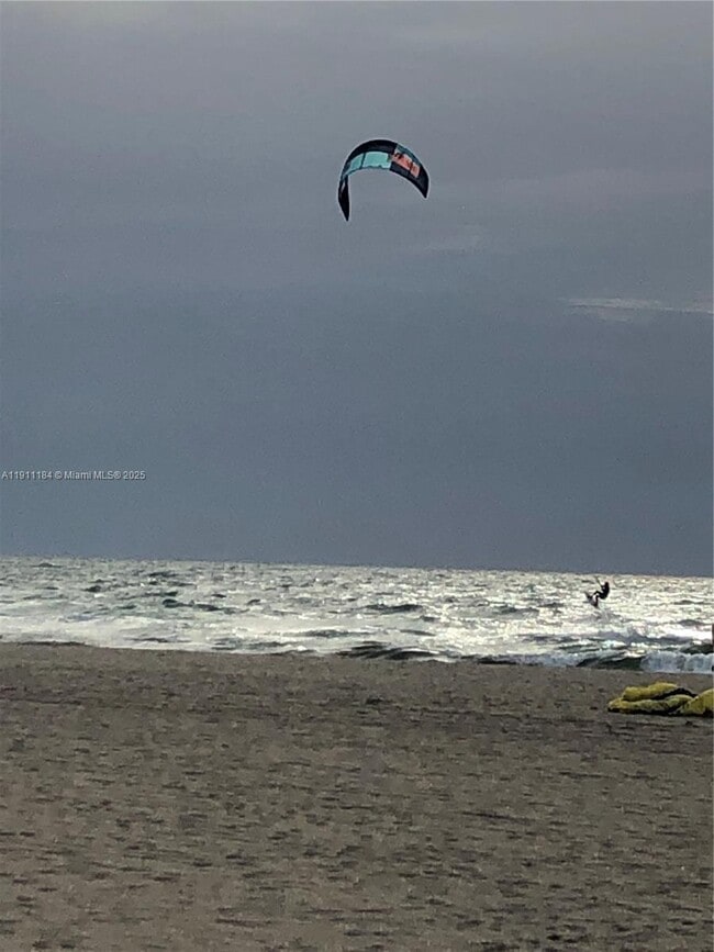 Building Photo - 5005 Collins Ave