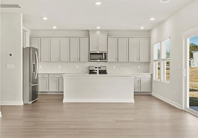 Building Photo - Beautiful 4/3 Available Now!