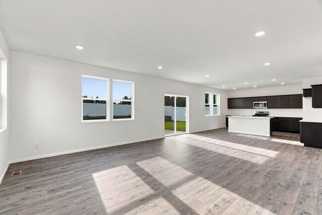 Building Photo - Spacious 5-Bedroom with Loft with 3-Car Garage