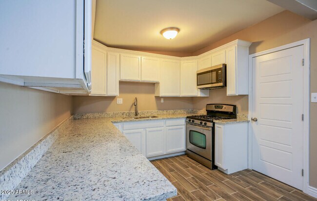 Building Photo - 4236 N 50th Dr