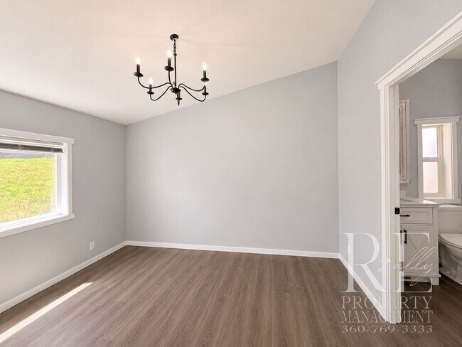 Building Photo - Walk to the Ferry from This Updated Port Orchard Home with Expansive Deck & Gated Yard