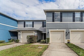 Building Photo - Walk to Waterford Lakes from this 3/2.5/1 ...