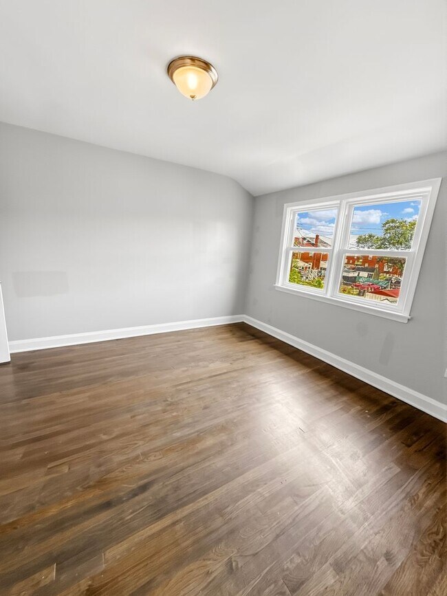 Building Photo - Spacious Dundalk Home with Finished Basement & Fireplace