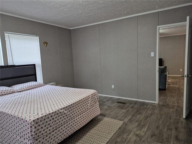 Building Photo - 6017 Whispering Pines