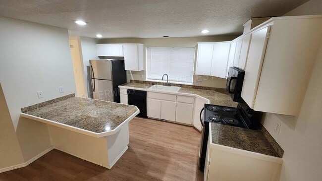 Building Photo - Remodeled 3 Bd Home W/ Washer & Dryer Hook-ups, Large Fenced Backyard, Gas Fireplace & 2 Car Garage!