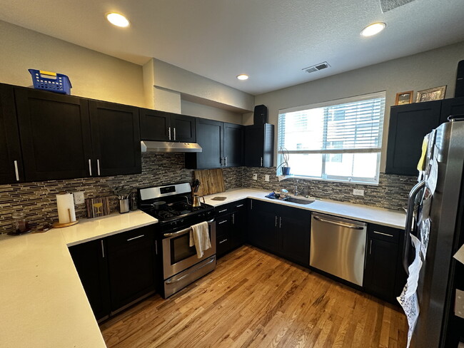 Building Photo - "Experience Modern Comfort: Spacious 2-Bed...