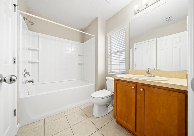 Building Photo - Corner Unit ~ Lake View ~ Maintenance Free...