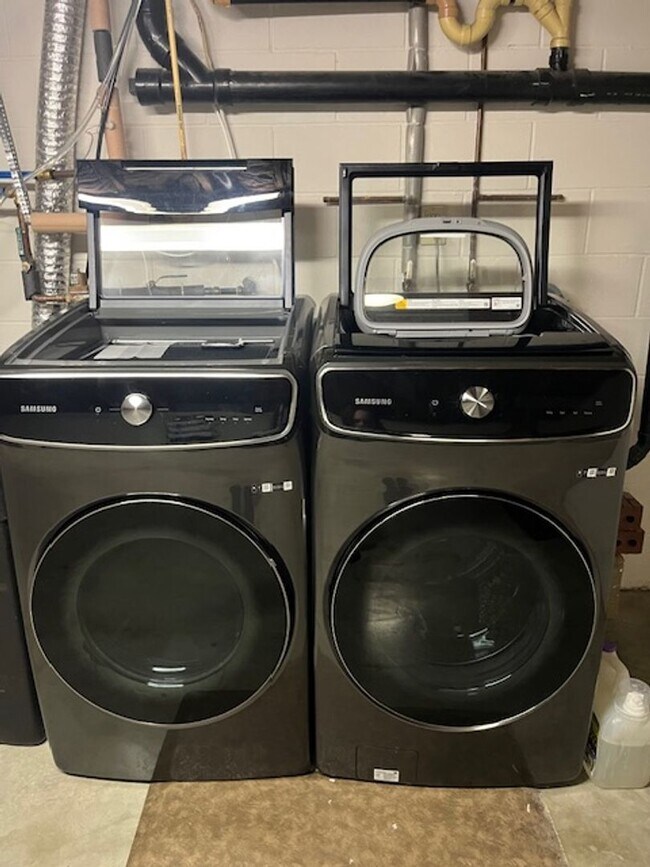 Building Photo - Spacious, Fully Updated Home with Walkout Basement on a Mature Lot