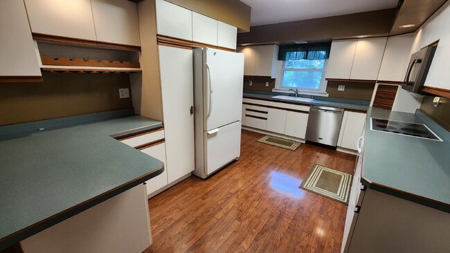 Building Photo - Spacious 4-Bedroom Home with Bonus Room, 3-Season Porch & Private Backyard