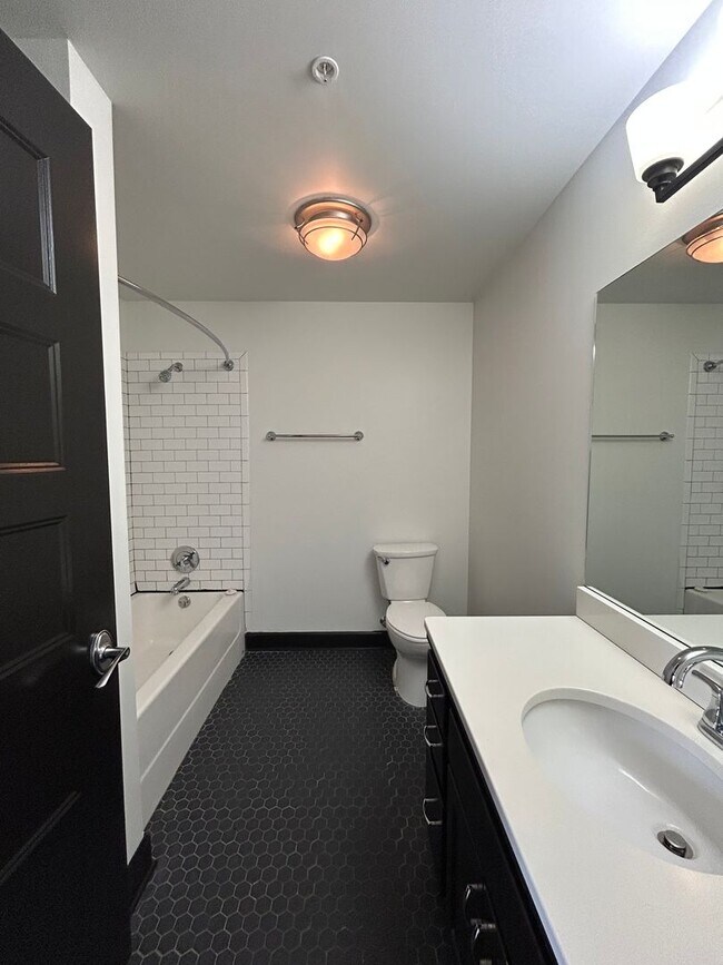 Building Photo - Sleek Downtown Living with a Modern Edge