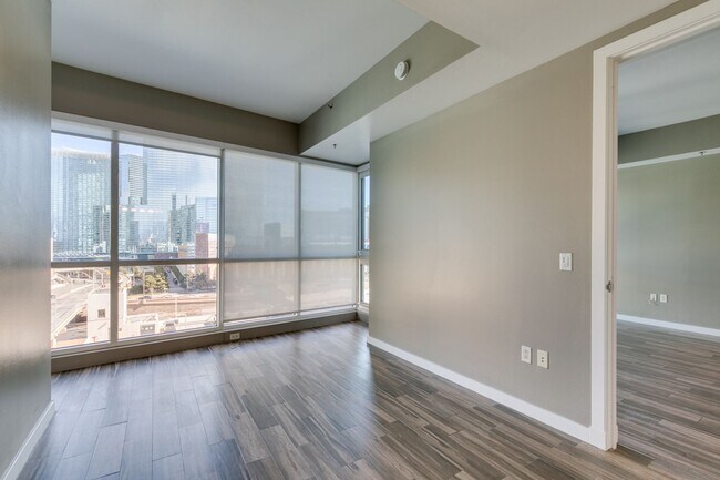 Building Photo - Iconic Strip-View Luxury | Elegant 1BR + Den High-Rise Residence