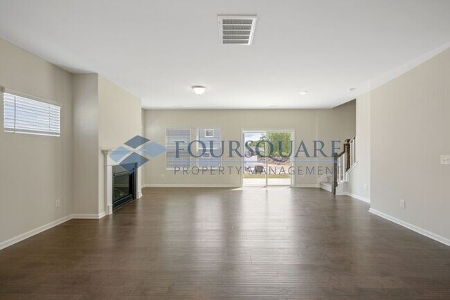 Building Photo - End-Unit Townhome with Loft, Open Floor Plan & Patio, Conveniently Located Near Dining, Shopping,...