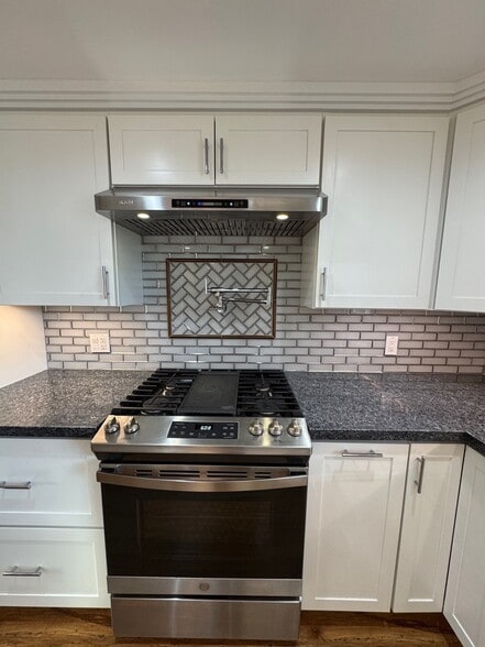 Pot filler over stove. - 22471 Loch Lomond Dr