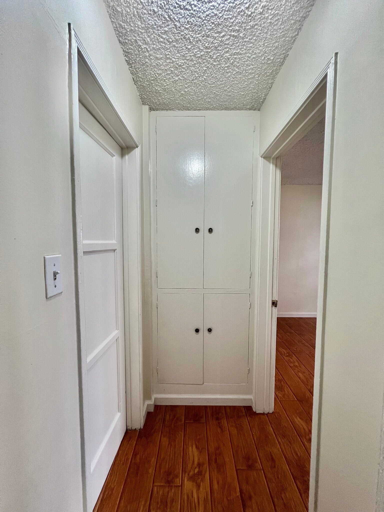 hallway with storage space. - 715 N Jackson St