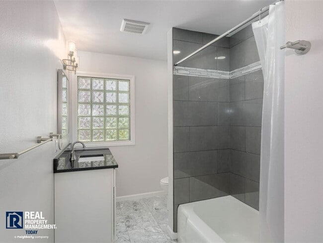 Building Photo - Rare Brown’s Point Beachfront Living – Stunning 3 Bed / 2 Bath Home!