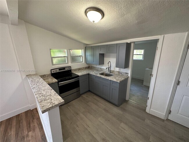 Building Photo - 5646 NW 3rd Ave