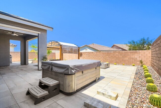 Building Photo - Stunning home with a serene Zen backyard, raised garden beds, fountain and spa!