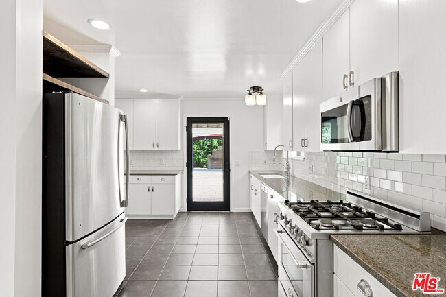 Building Photo - 4415 Woodland Ave