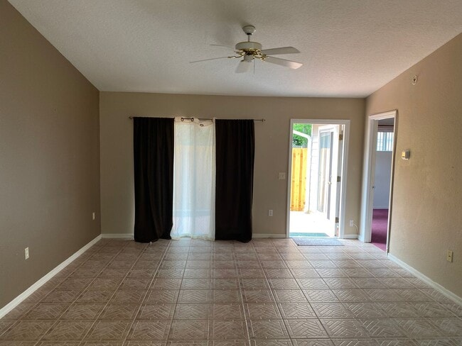Building Photo - SPACIOUS, FIRST FLOOR CONDO WITH BIG FENCED IN PATIO IN THE LOVELY COMMUNITY OF QUAIL RIDGE!