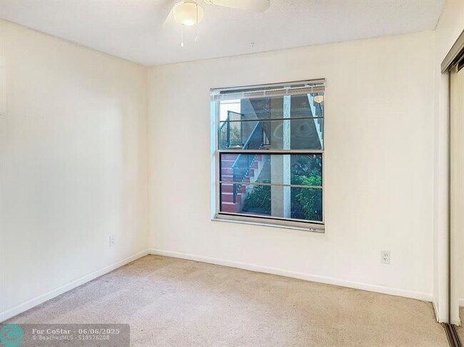 Building Photo - 6090 N Sabal Palm Blvd