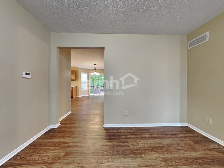 Building Photo - 8676 Woolstone Ct