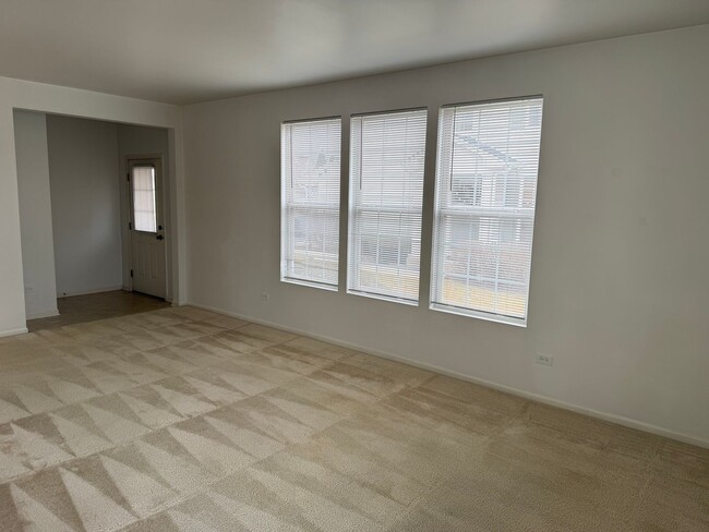 Building Photo - Partially Furnished - Bright & Spacious 2BR/1.5 BA CONDO - End-Unit w/ 2-Car Garage, Appliances, ...