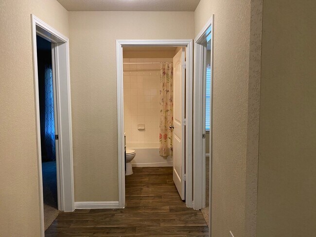 Building Photo - Three Bedroom, Two Bath, Two Car Garage, Washer and Dryer are included.