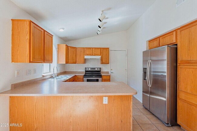 Building Photo - 43741 W Wade Dr