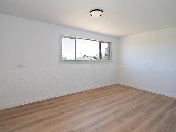 Building Photo - "Charming 5-Bed Sanctuary with Cozy Fireplace on South Rogers Street!"