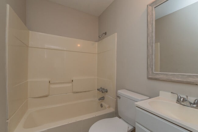Building Photo - Brick home with a fenced-in yard! Section 8 accepted