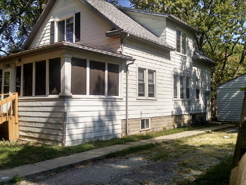 SW corner of front porch - 1306 Hickory St