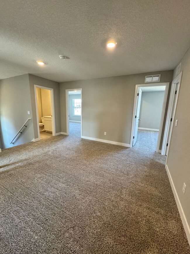 Building Photo - Brand-New 4-Bedroom Home with Modern Finis...