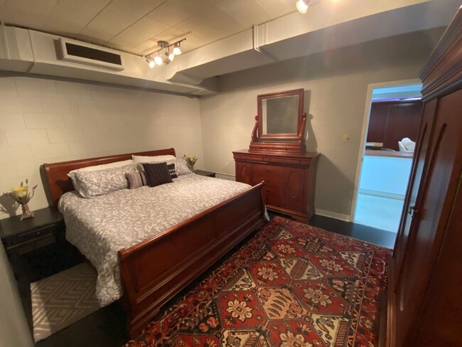 Building Photo - Furnished Loft-Style Apartment
