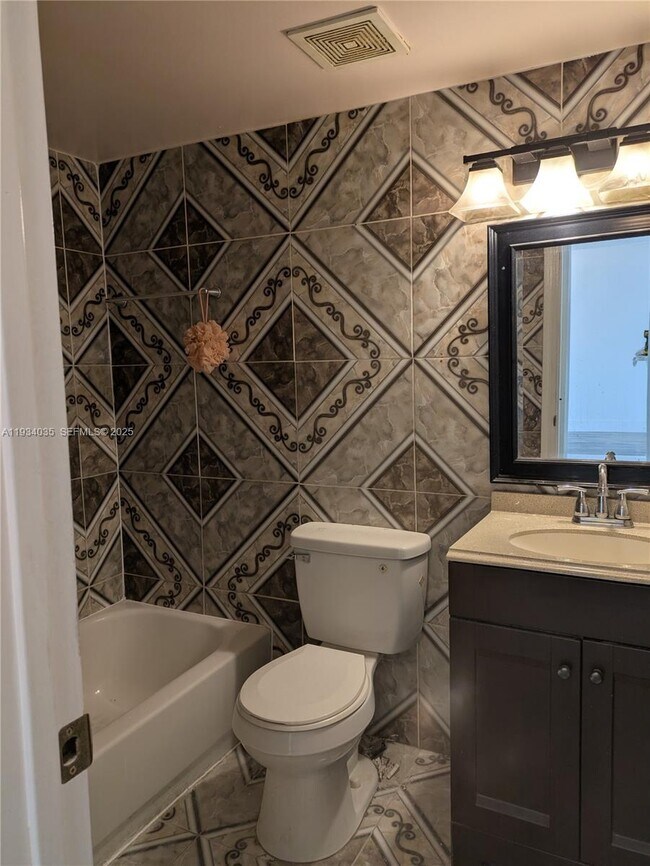 Building Photo - 2401 NW 56th Ave