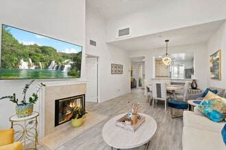 Building Photo - Elegant Furnished Penthouse Retreat with Treetop Views