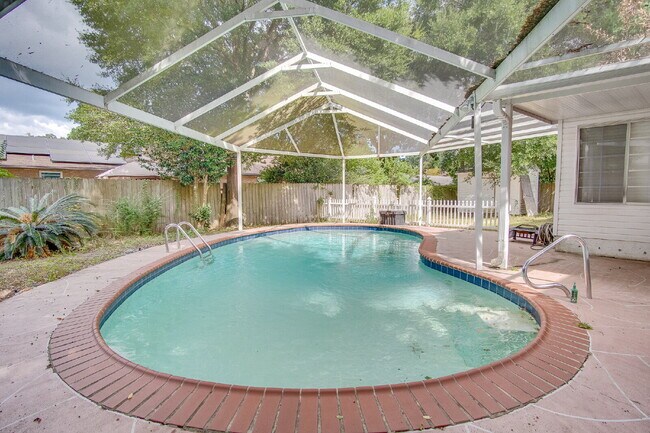 Building Photo - Pool Home with Office, Two Primary Suites ...