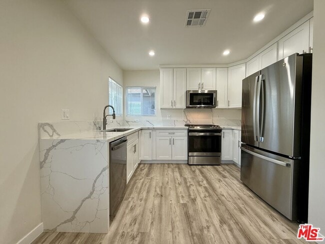 Building Photo - 5248 Whitsett Ave